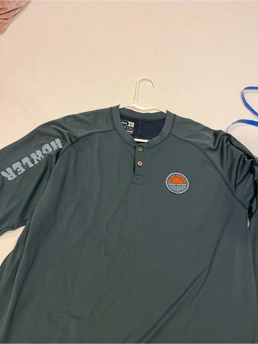 Howler Brothers Men's Dark Teal Long-Sleeve Henley with Light Blue Sleeve Logo